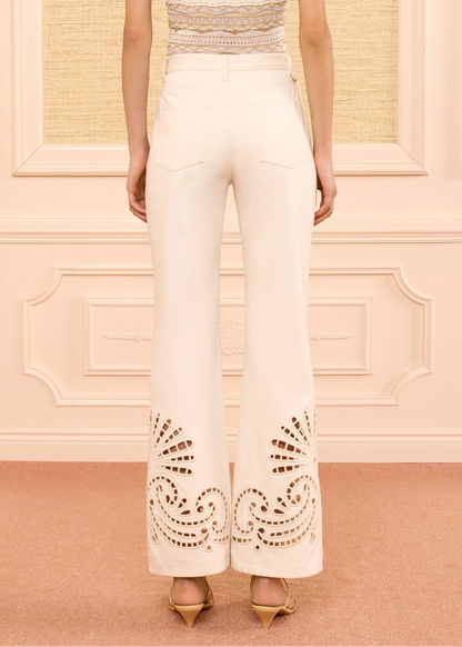 person wearing ulla johnson womens The Lou Jean with Eyelet cowrie ivory wash