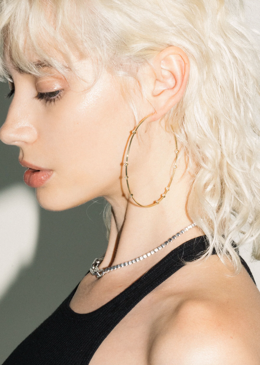 person wearing uniform object womens fine jewelry Diamond Float 3" Hoops