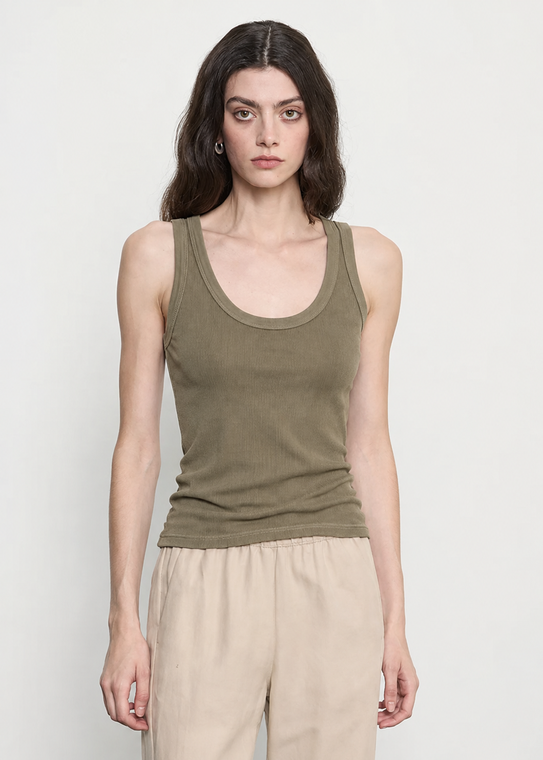 Person wearing womens enza costa Silk Rib Bold Tank in Olive Oil