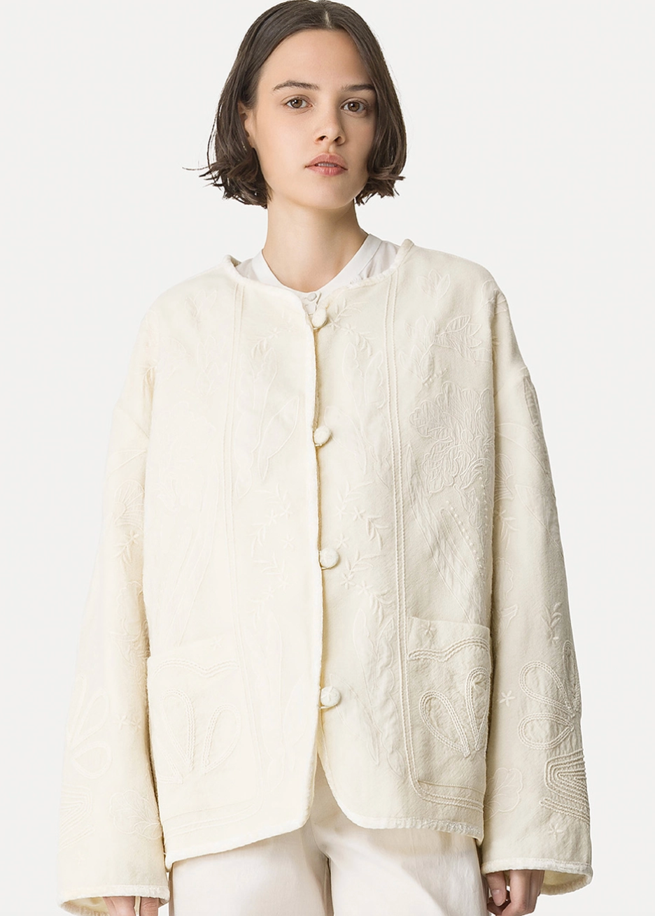 person wearing womens forte forte Iris Velvet Embroidered Blouson in avorio cream white