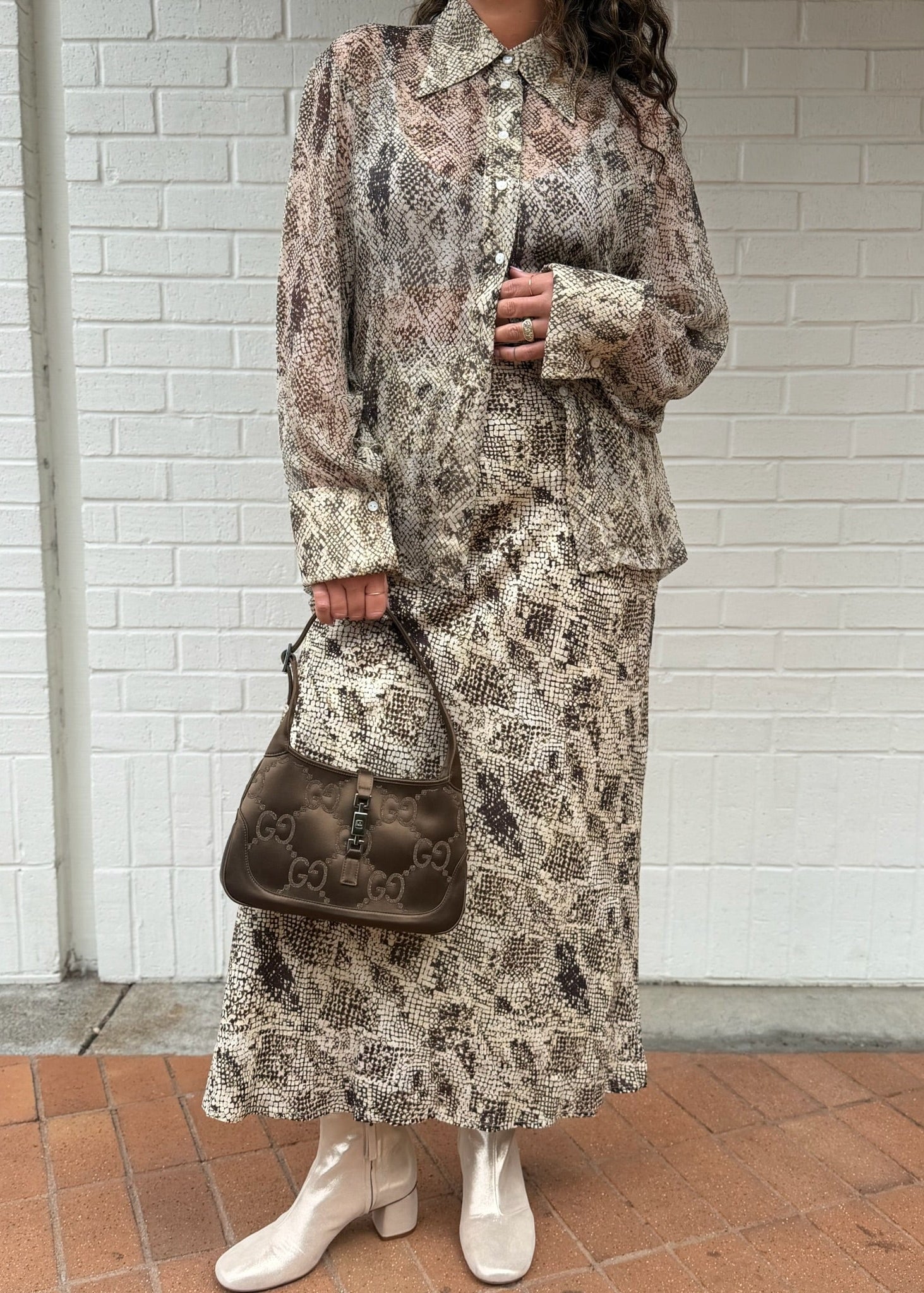 person wearing womens new arrivals clothing bags shoes fine jewelry  ulla johnson forte forte gucci shola branson