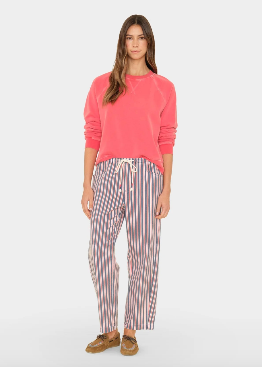 person wearing xirena denim Baxter Pant in regatta blue stripe