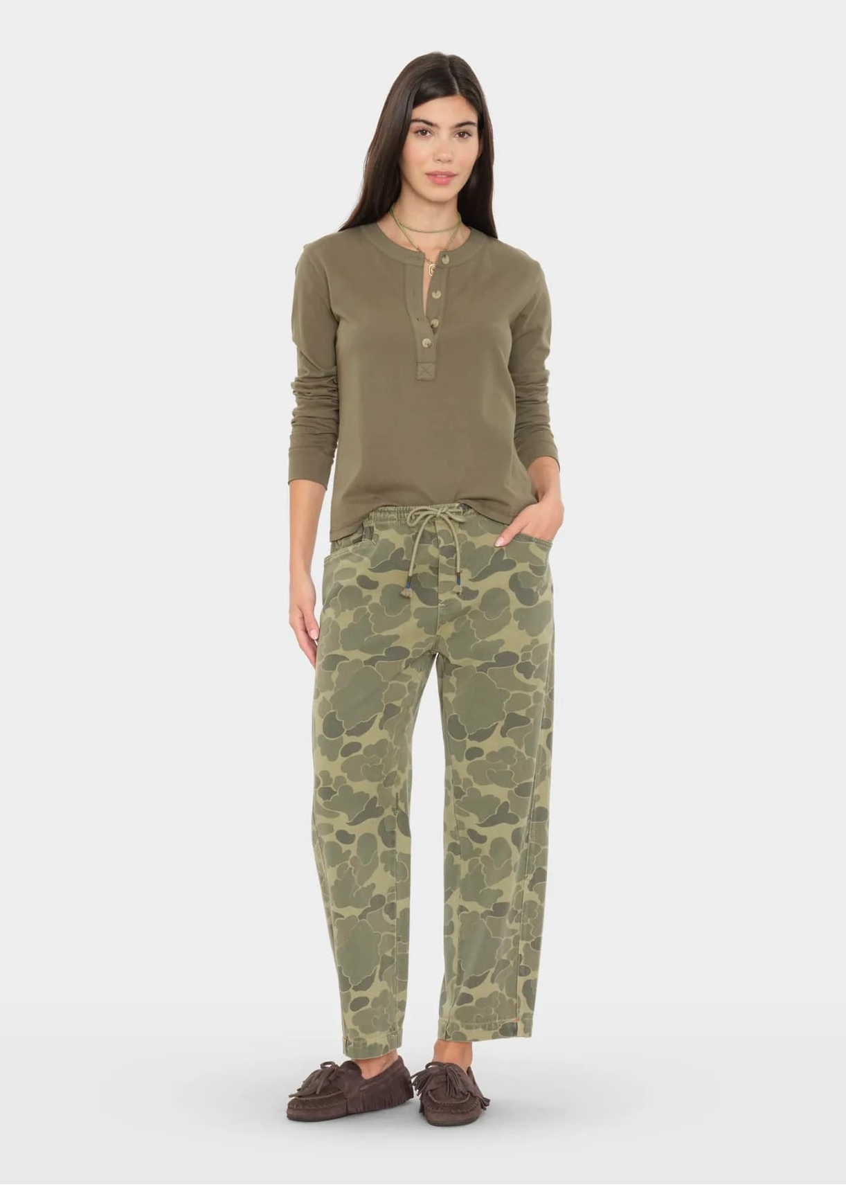 person wearing xirena womens Baxter Pant in Camo Green