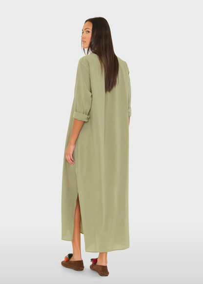 person wearing xirena womens Boden Dress in Dark Seagrass
