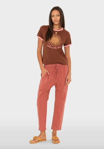 person wearing xirena womens Draper Pant in Cinnabar