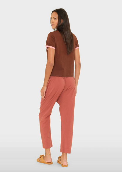 person wearing xirena womens Draper Pant in Cinnabar