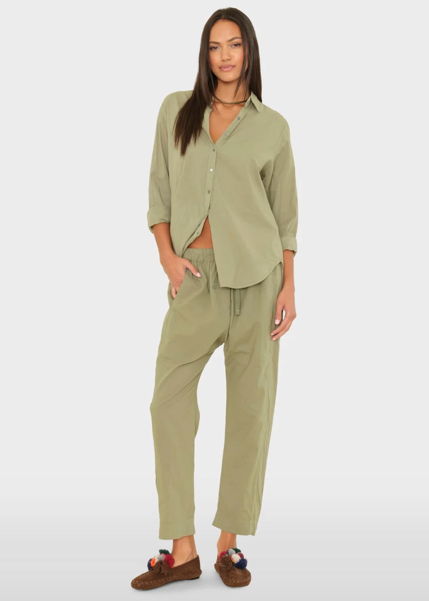 person wearing xirena womens Draper Pant in Dark Seagrass