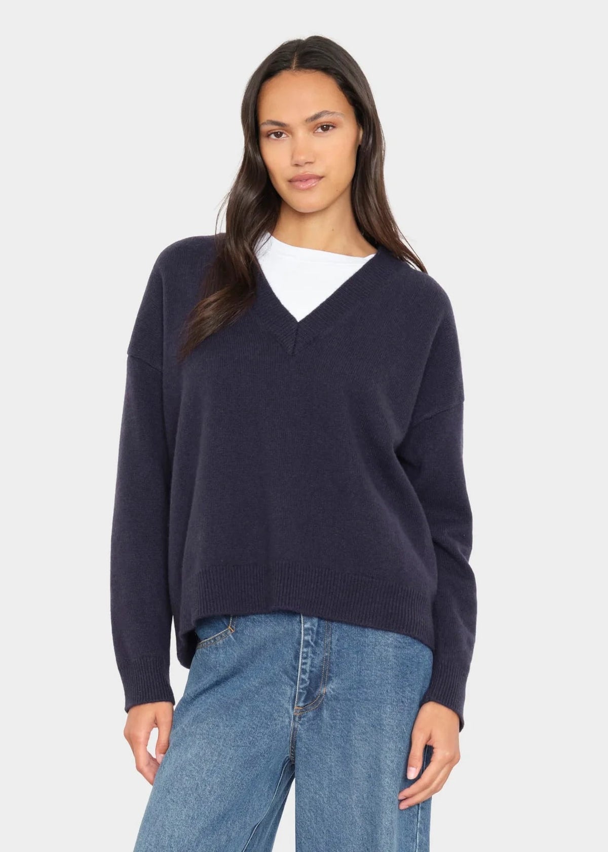person wearing xirena womens Jodie Sweater in Midnight Blue Cashmere