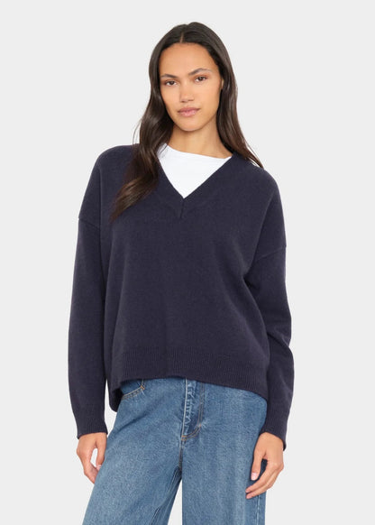 person wearing xirena womens Jodie Sweater in Midnight Blue Cashmere