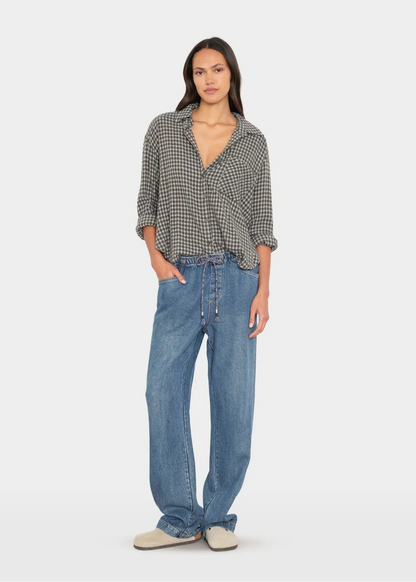 person wearing xirena womens Joey Denim Pant in Meridian Blue