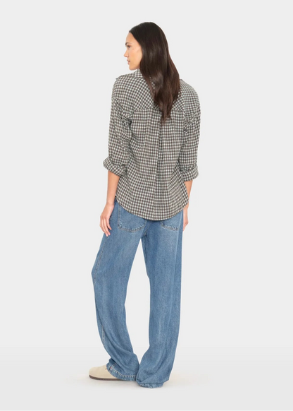 person wearing xirena womens Joey Denim Pant in Meridian Blue