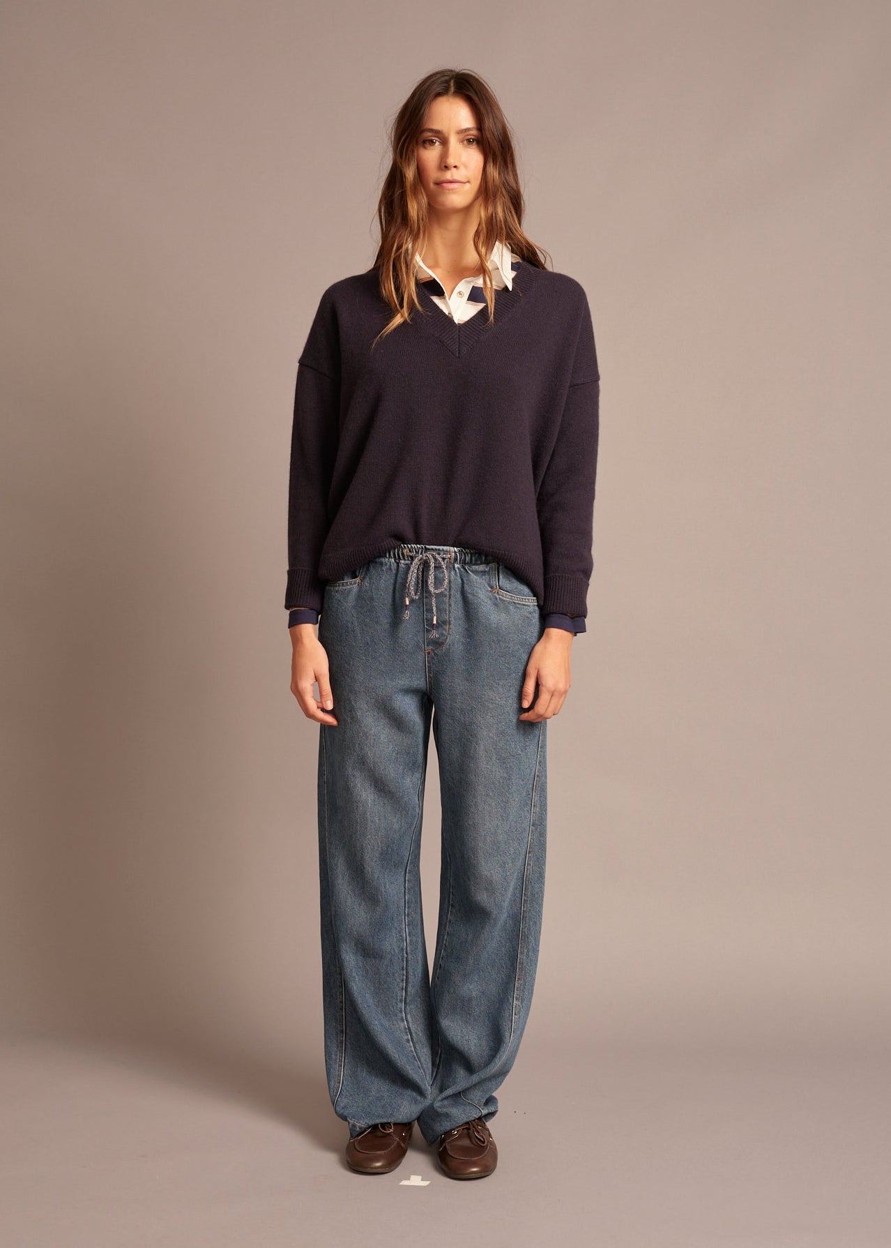 person wearing xirena womens Joey Denim Pant in Meridian Blue