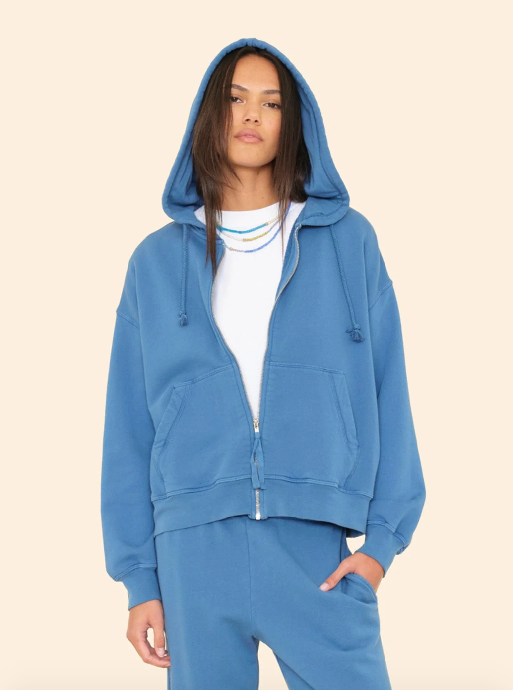 Person wearing xirena womens Smith Sweatshirt in in Storm Blue