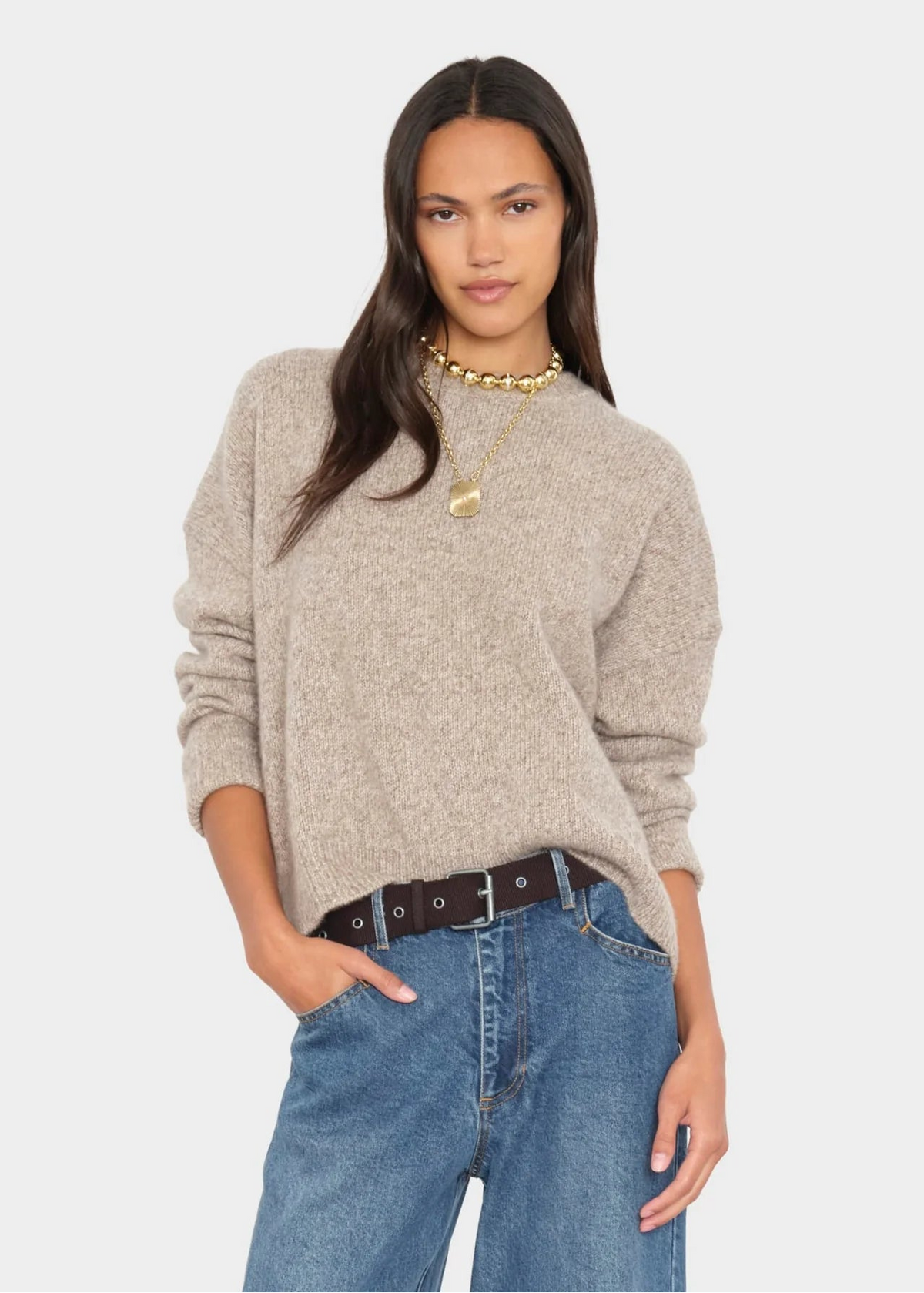 person wearing xirena womens cashmere Lela Sweater in Ivory Oat