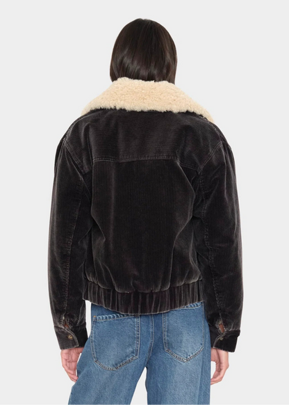 person wearing xirena womens corduroy Bradley Jacket black flint with sherpa collar