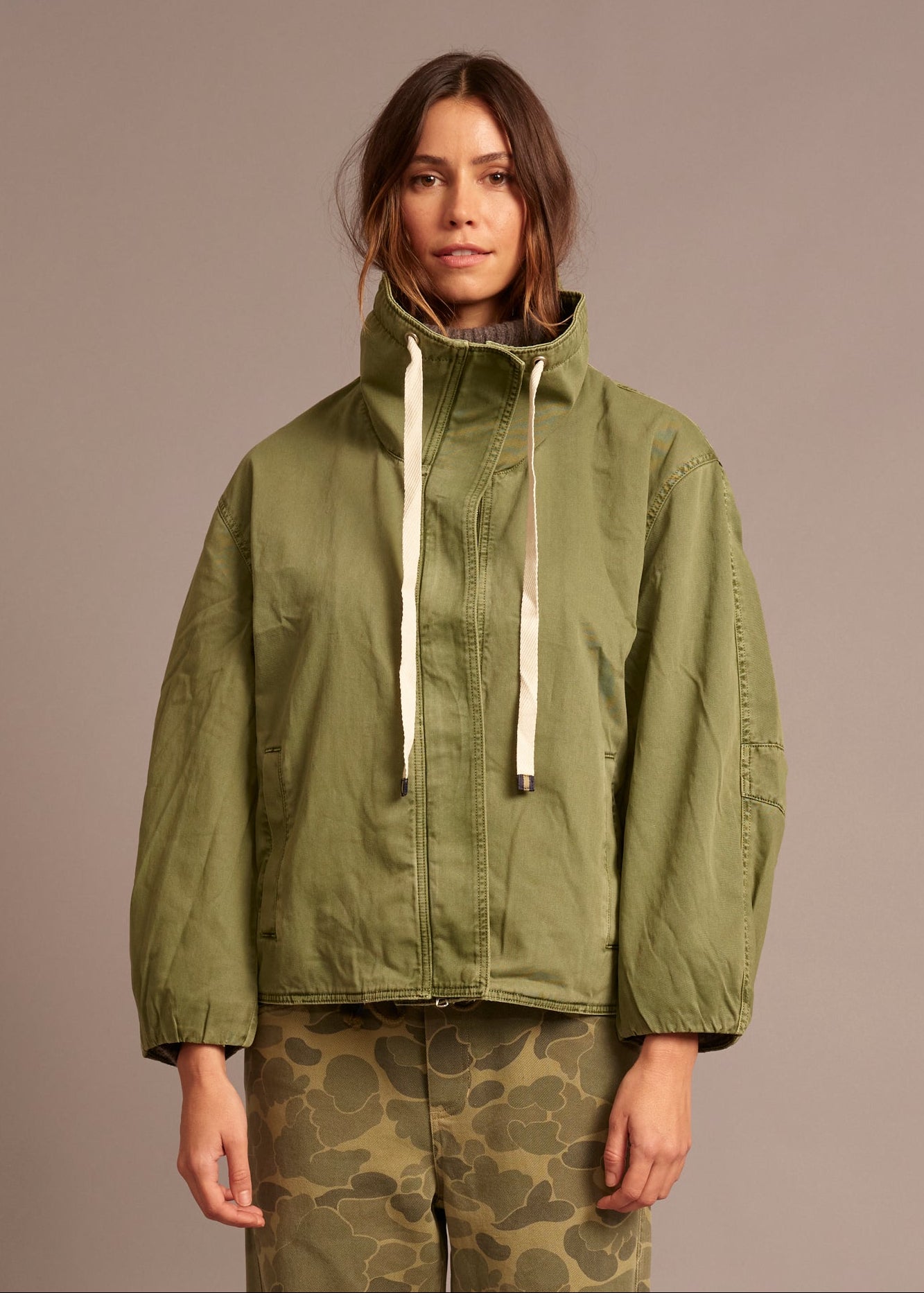 person wearing xirena womens cotton Harrison Jacket in Saguaro Green