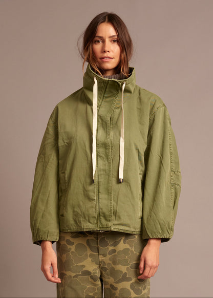 person wearing xirena womens cotton Harrison Jacket in Saguaro Green