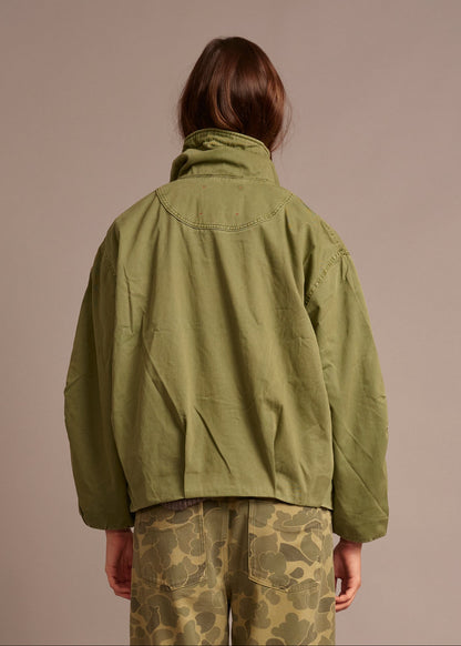 person wearing xirena womens cotton Harrison Jacket in Saguaro Green