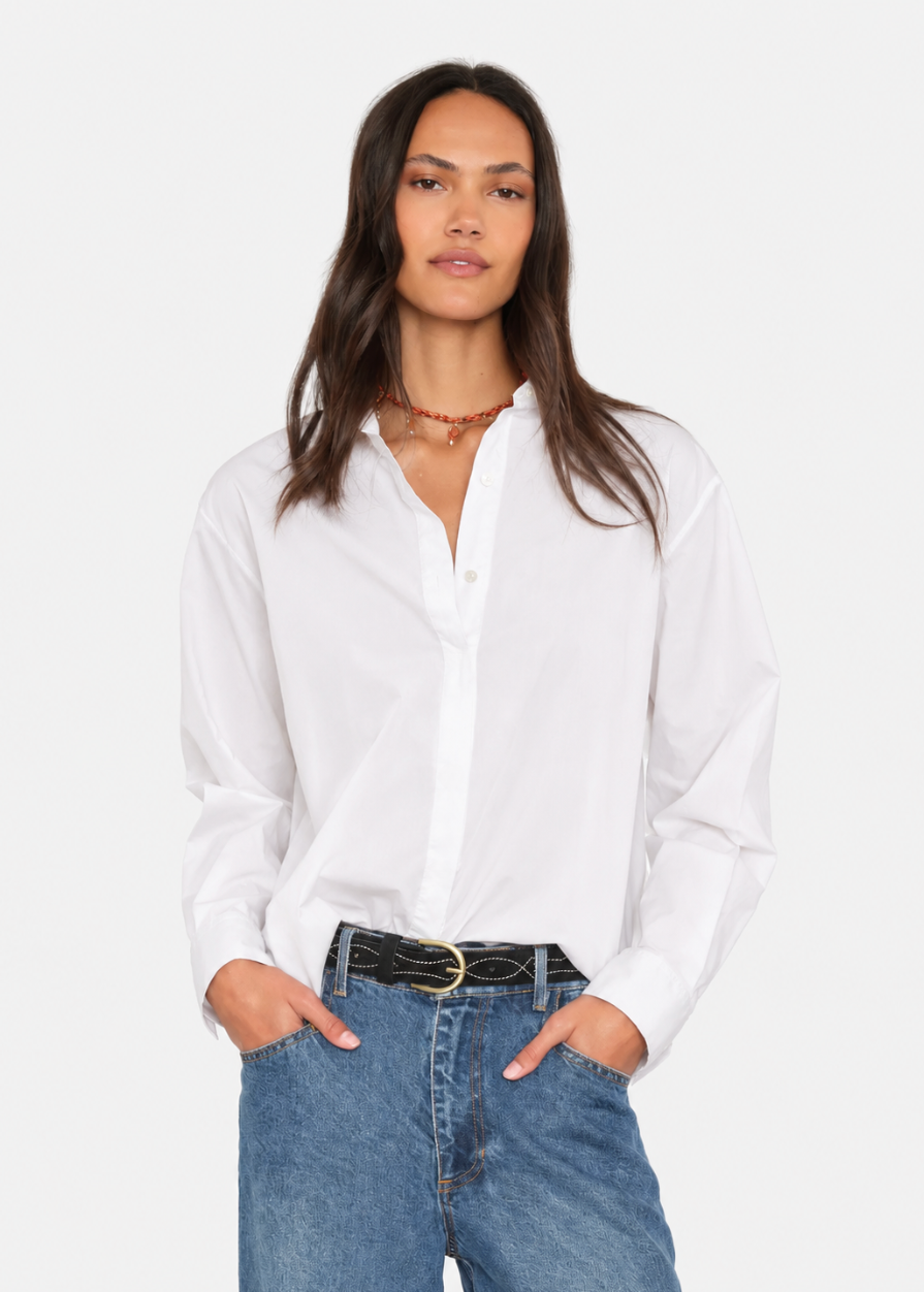 person wearing xirena womens cotton poplin Hayes Shirt in Pearl White