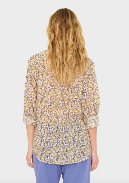 person wearing xirena womens printed Beau Shirt in Sun Petals